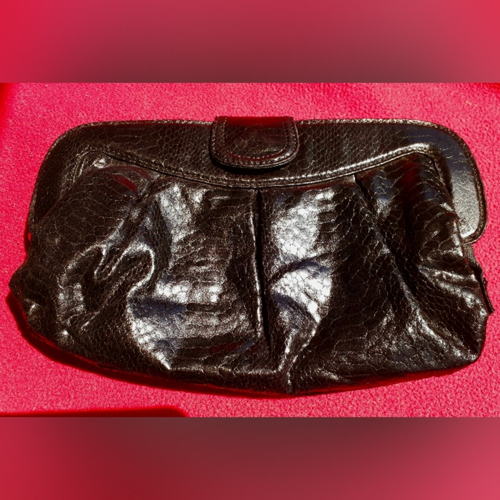Accessorize shiny black snakeskin clutch purse